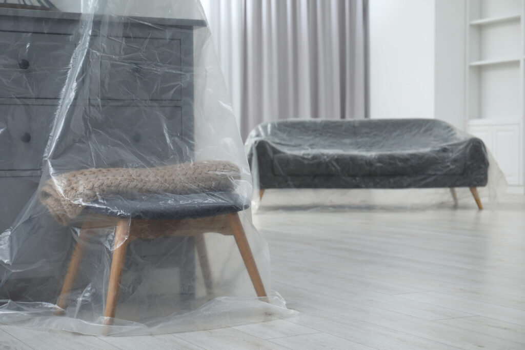 Sofa covered in Plastic Film