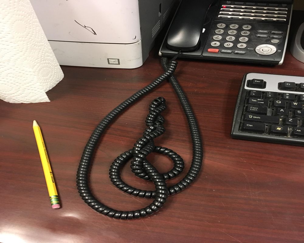 Landline Phone Chats with Tangled Cords