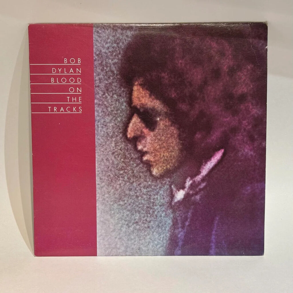 blood on the tracks cover