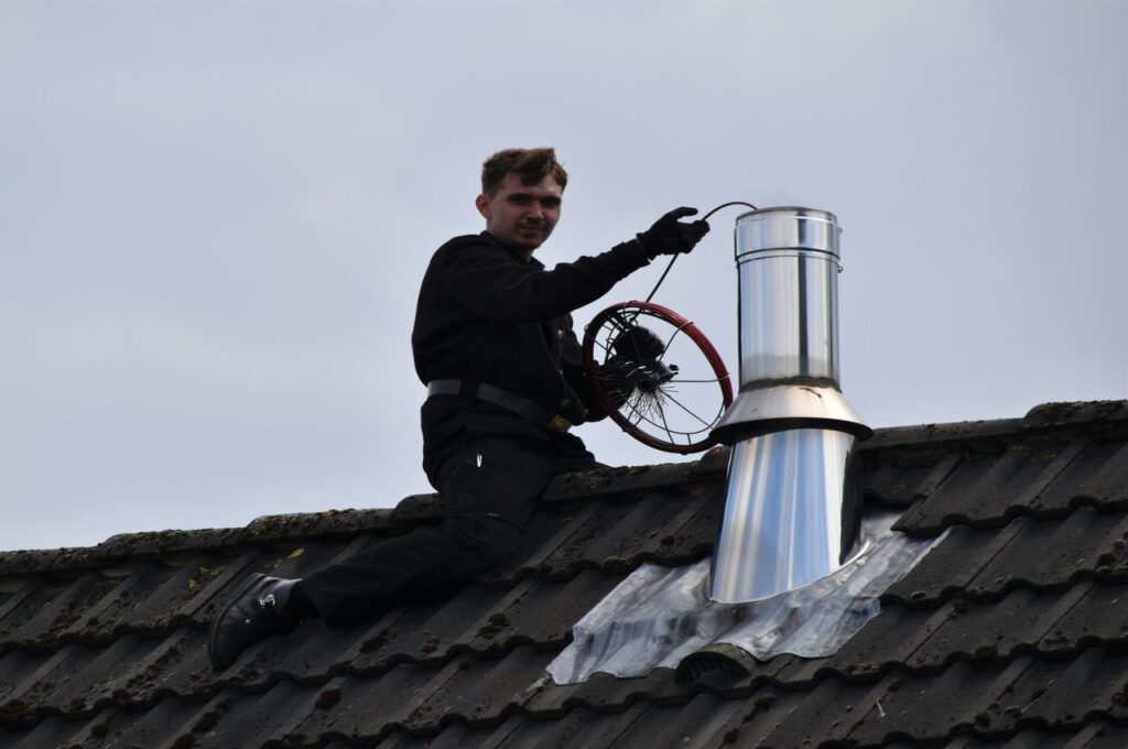 Chimney Sweeps: Cleaning Homes from the Chimney Top Down
