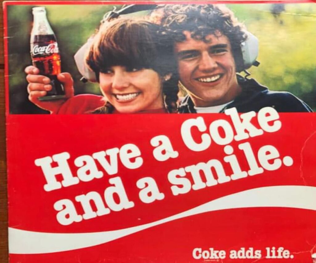 "Have a Coke and a Smile" - Coca-Cola