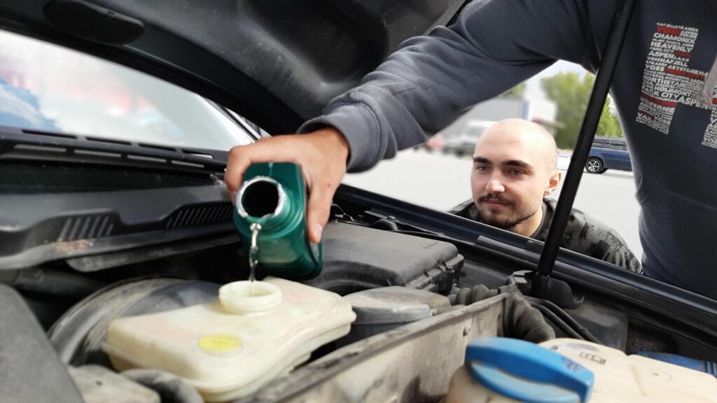 Changing Car Oil in Driveway
